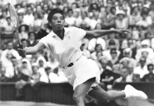 New York's Althea Gibson prepares to volley against Brittain's Ann Haydon during the Wimbledon womens singles semi-final tennis match in the All England Lawn in Wimbledon, England on July 3, 1958. Gibson won 6-2, 6-0, after only 30 minutes of play. (AP Photo)